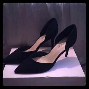 Brand new, never worn black pumps